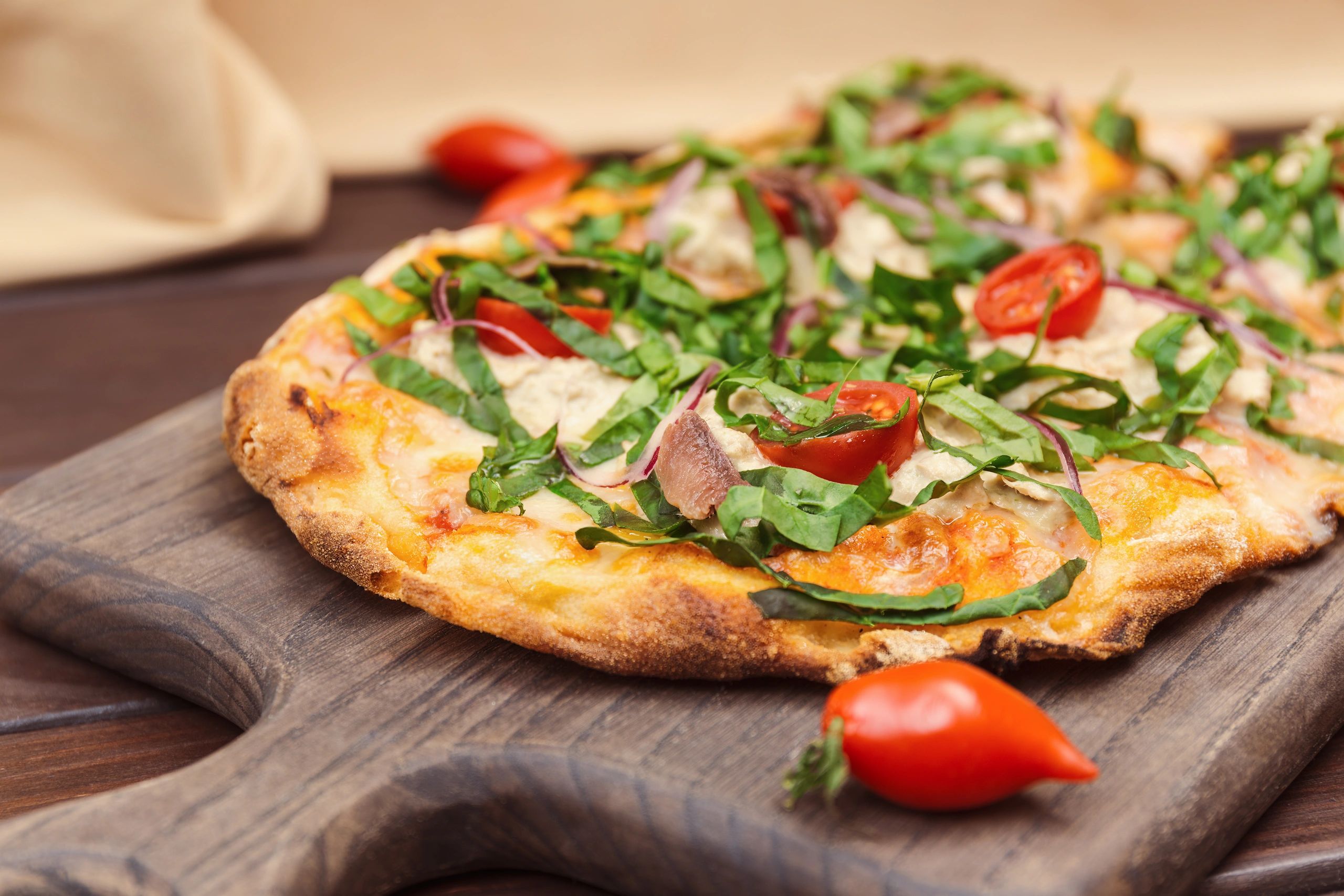 Rustic Italian pizza with anchovy and capers